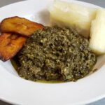 Congolese pondu served with plantains and cassava