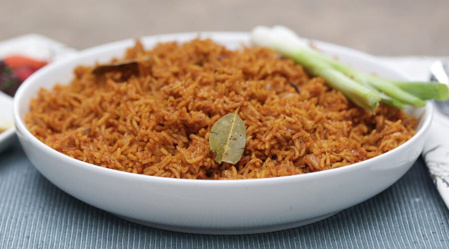 Nigerian jollof rice on a white plate