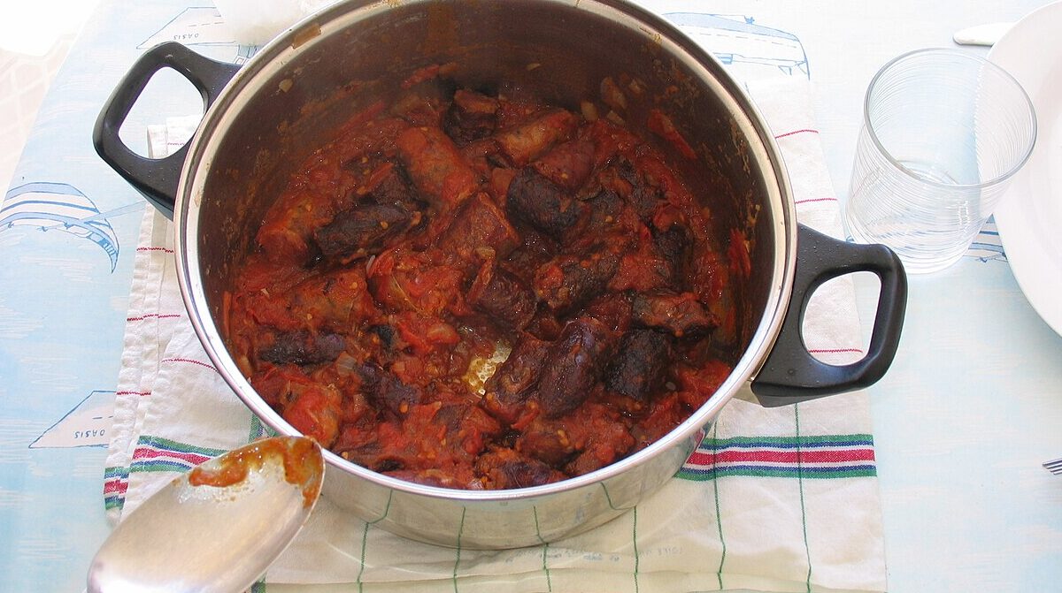 Réunion rougail saucisse with smoked sausage in a rich tomato sauce